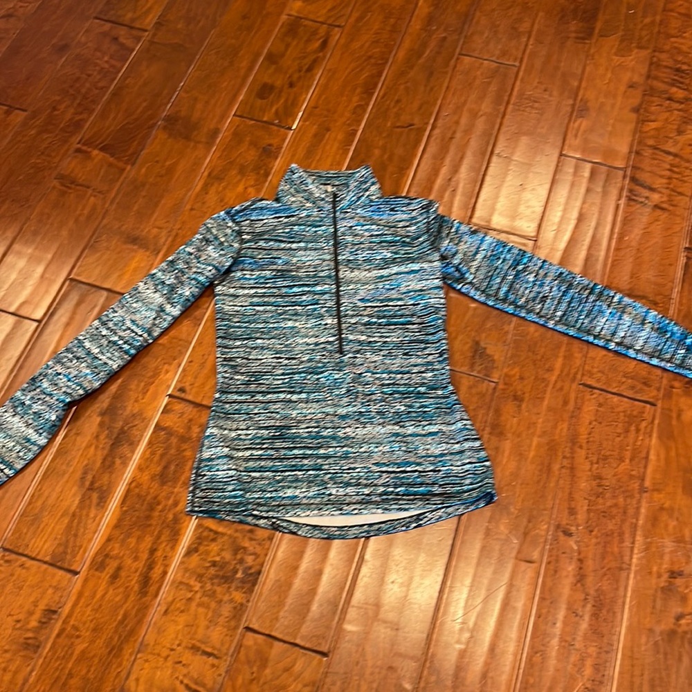 Women’s Nike pro long sleeve, half zip winter gear.